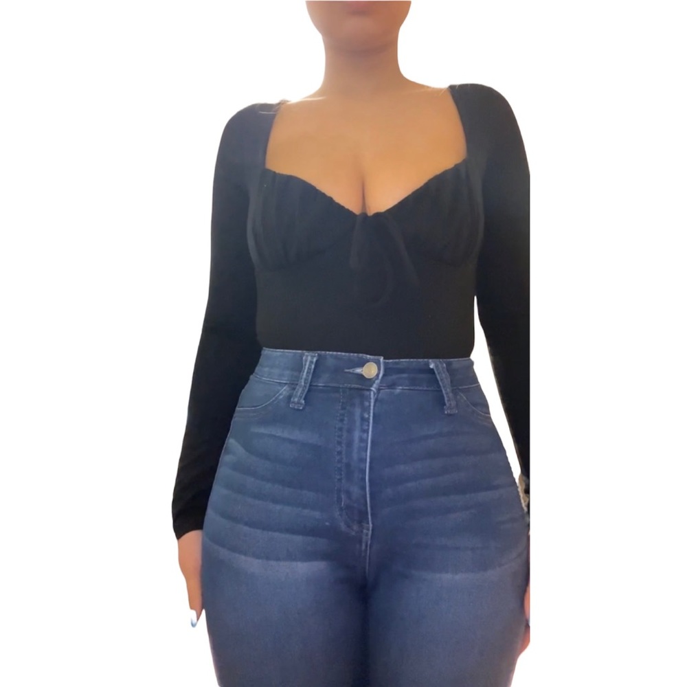 Super cute and chic black body suit